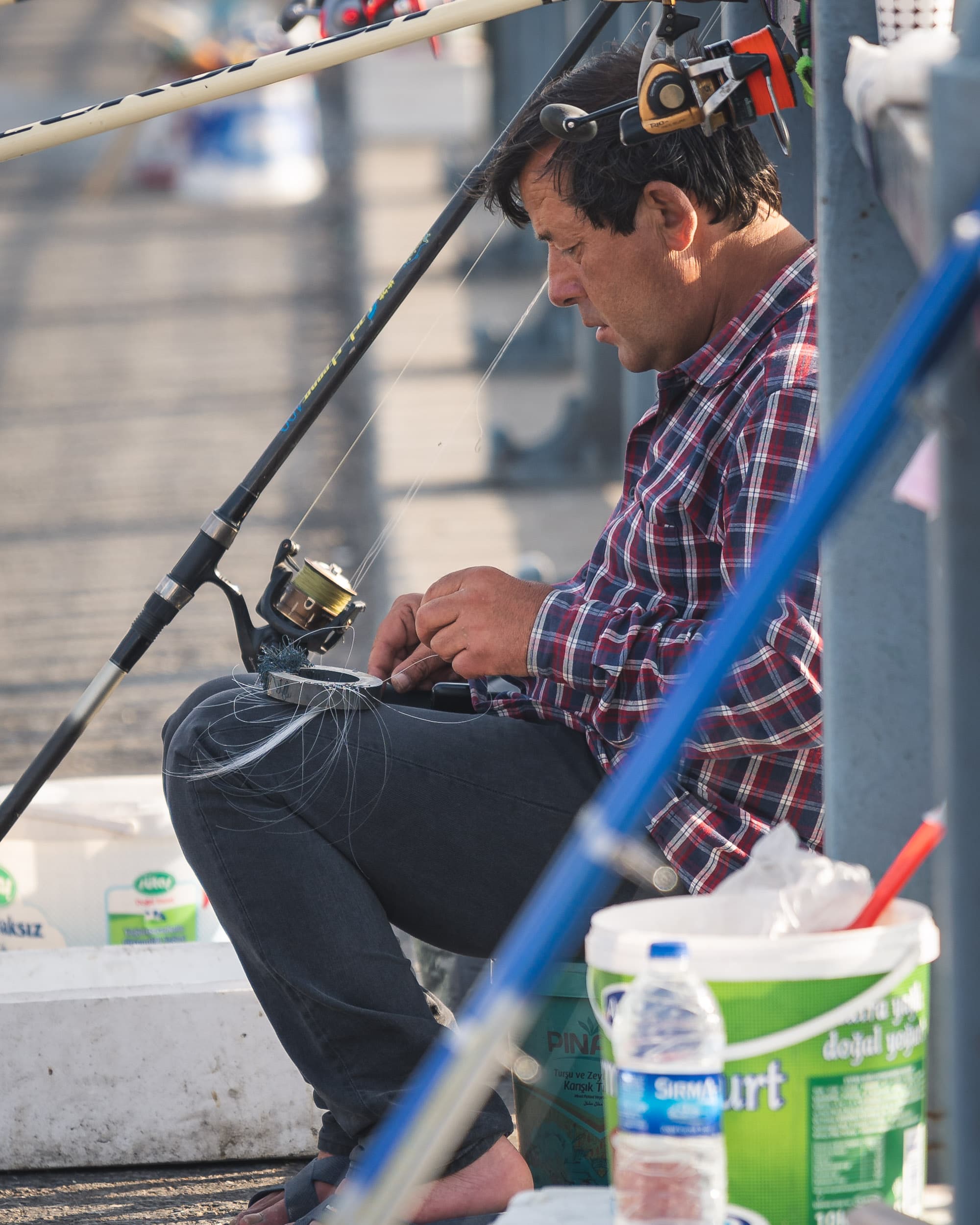 fisherman on galata bridge in Istanbul fisherman on galata bridge in Istanbul