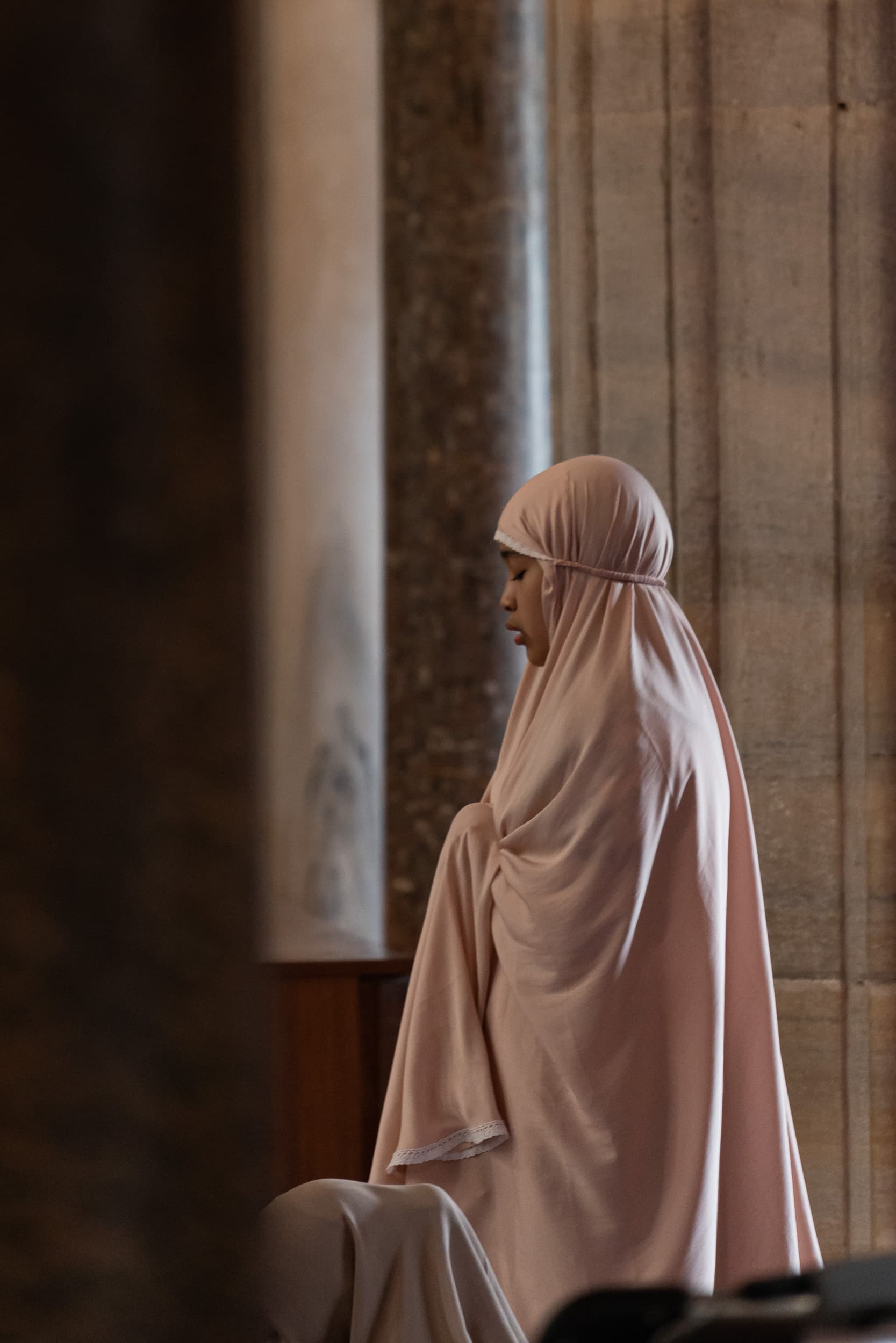 woman prayers blue mosque woman prayers blue mosque