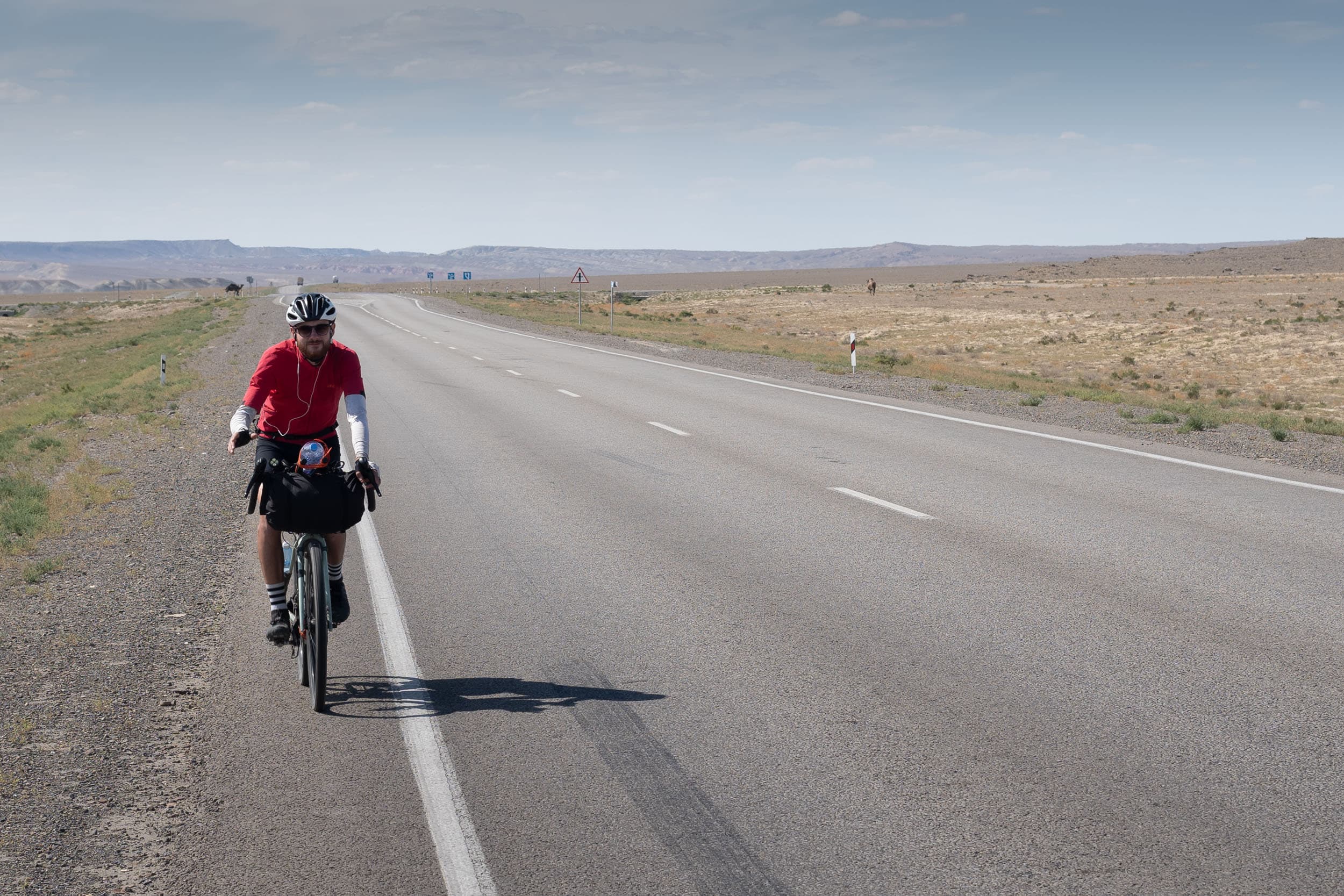 Andrew cycling the Kazakh desert