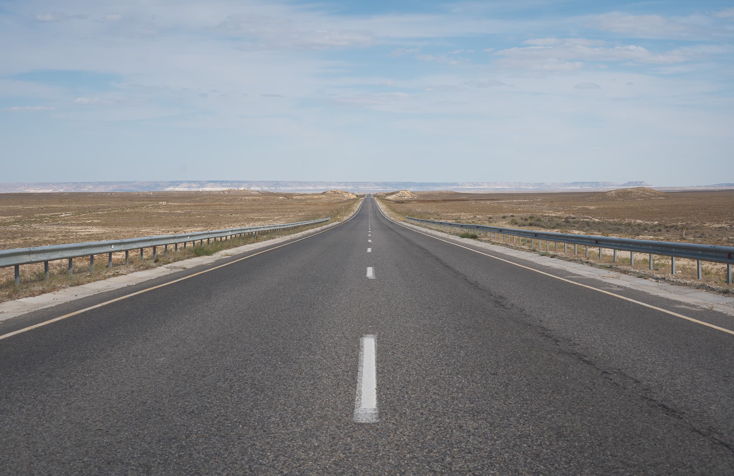 long and lonely desert road long and lonely desert road