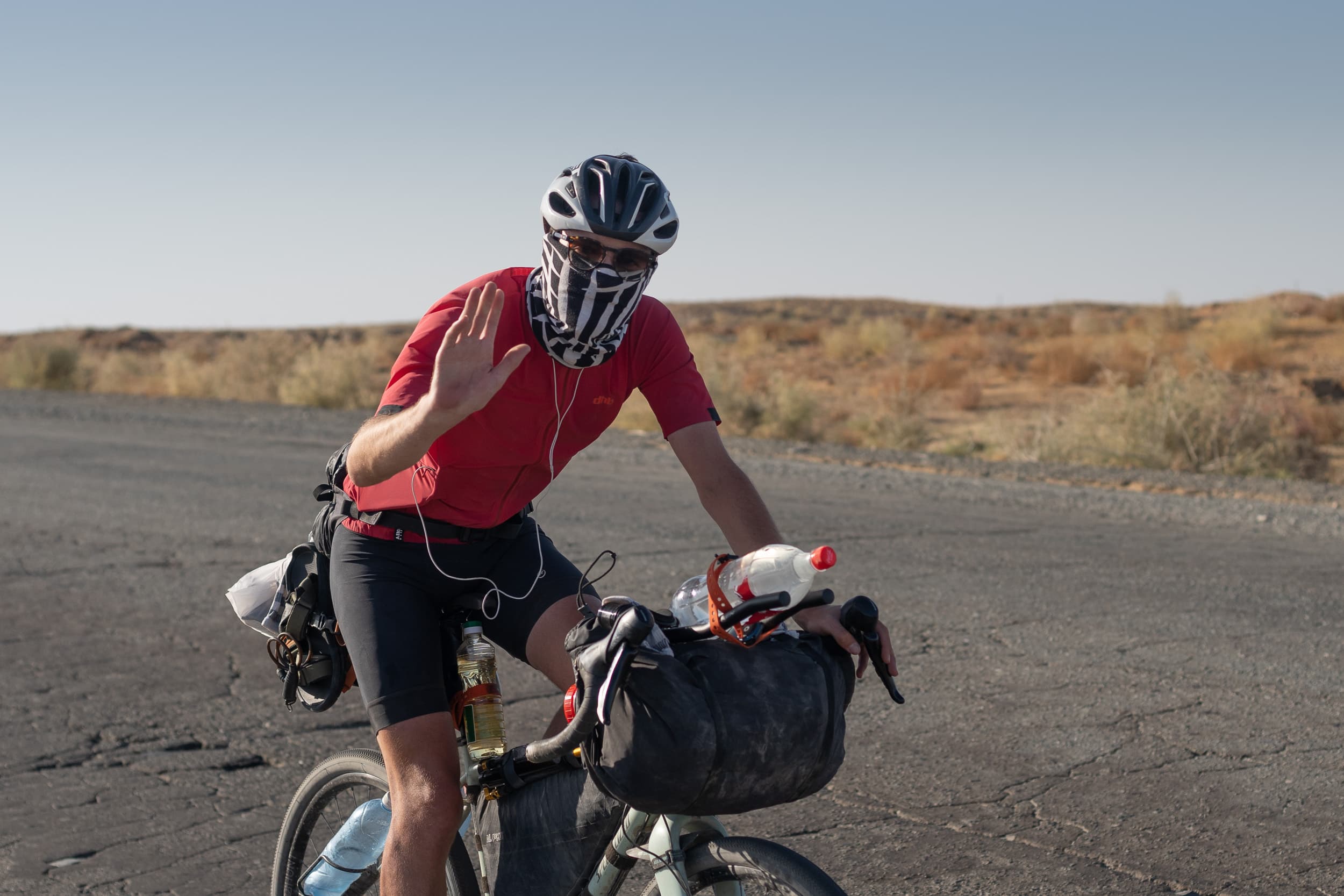 Andrew cycling the Kysylkum desert Andrew cycling the Kysylkum desert