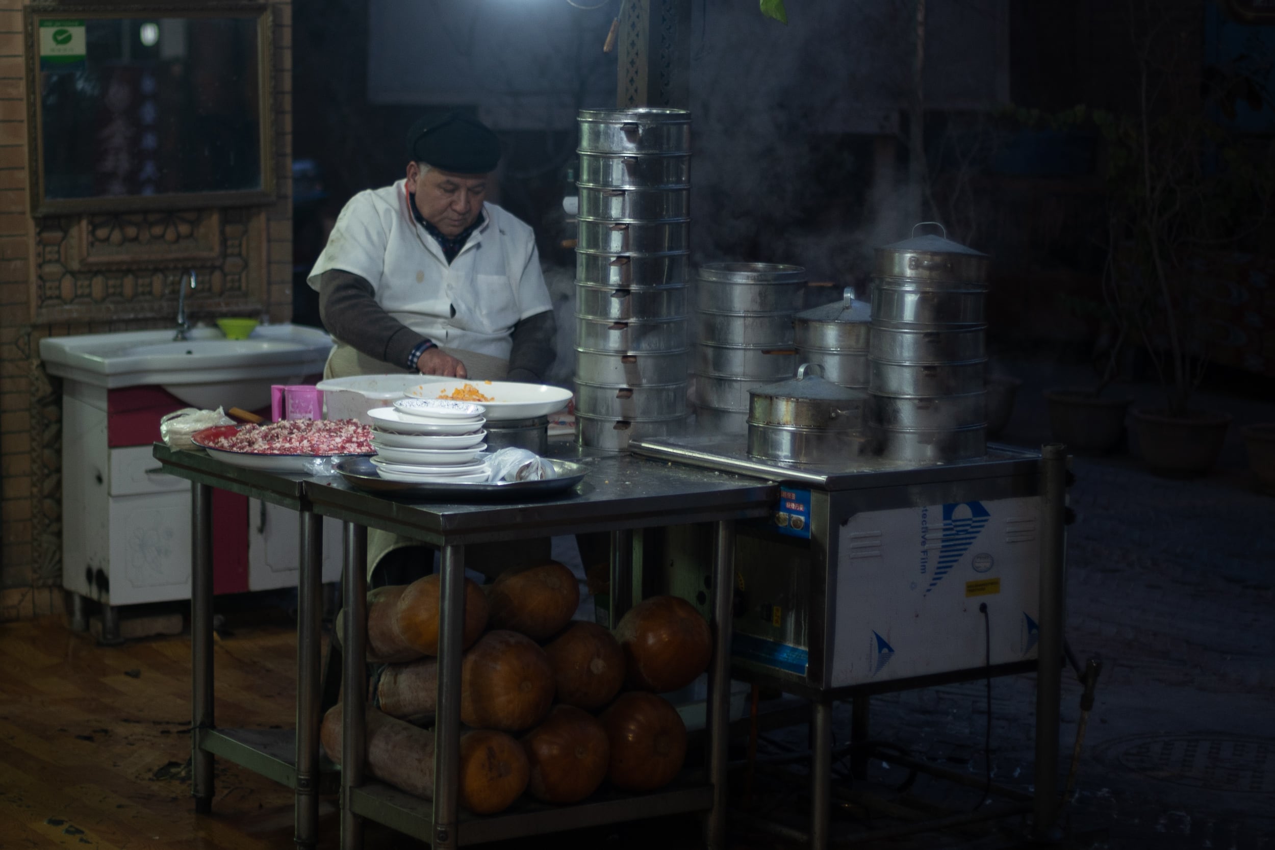 man preparing Somsas China man preparing Somsas China