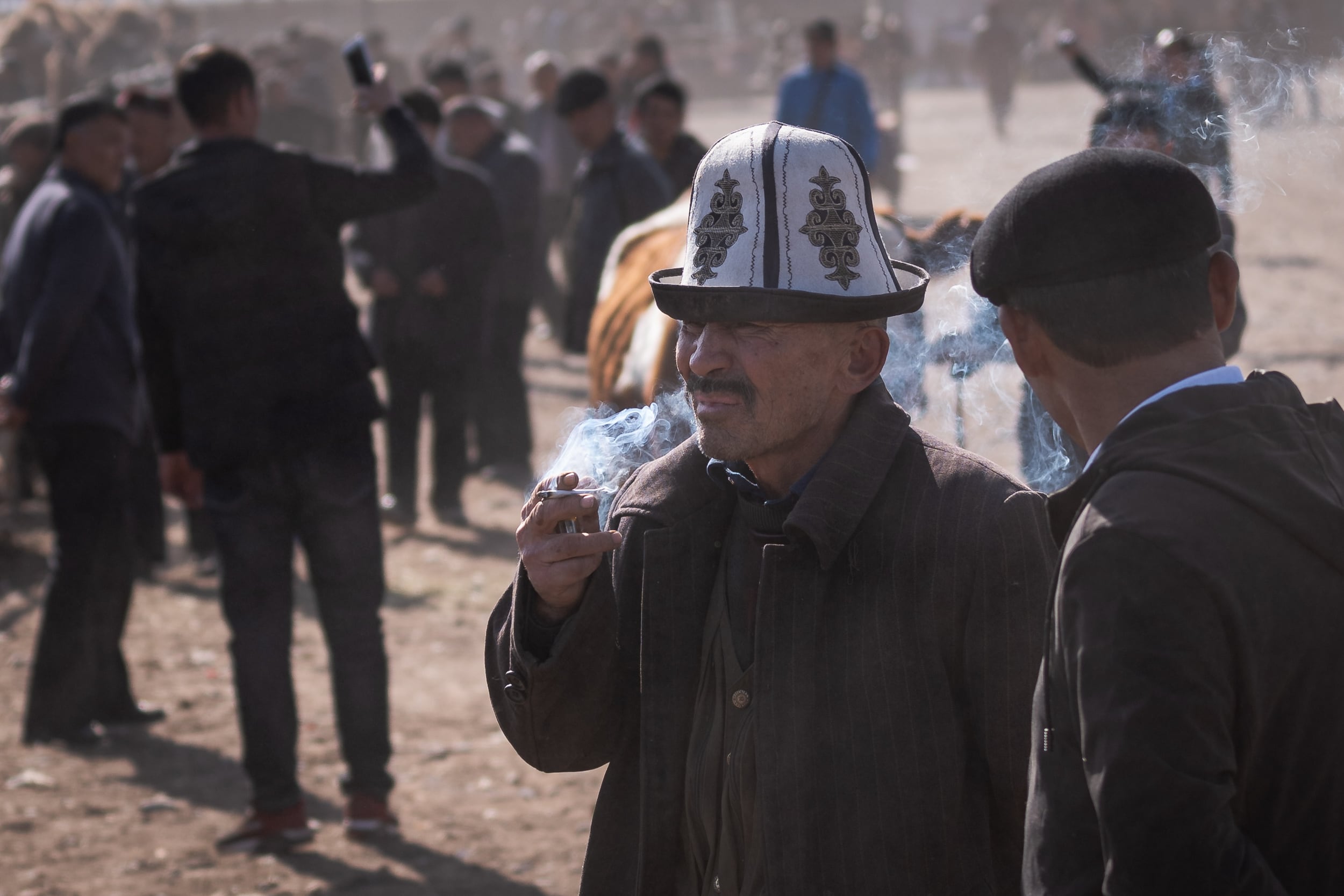 man smoking Kashgar China man smoking Kashgar China
