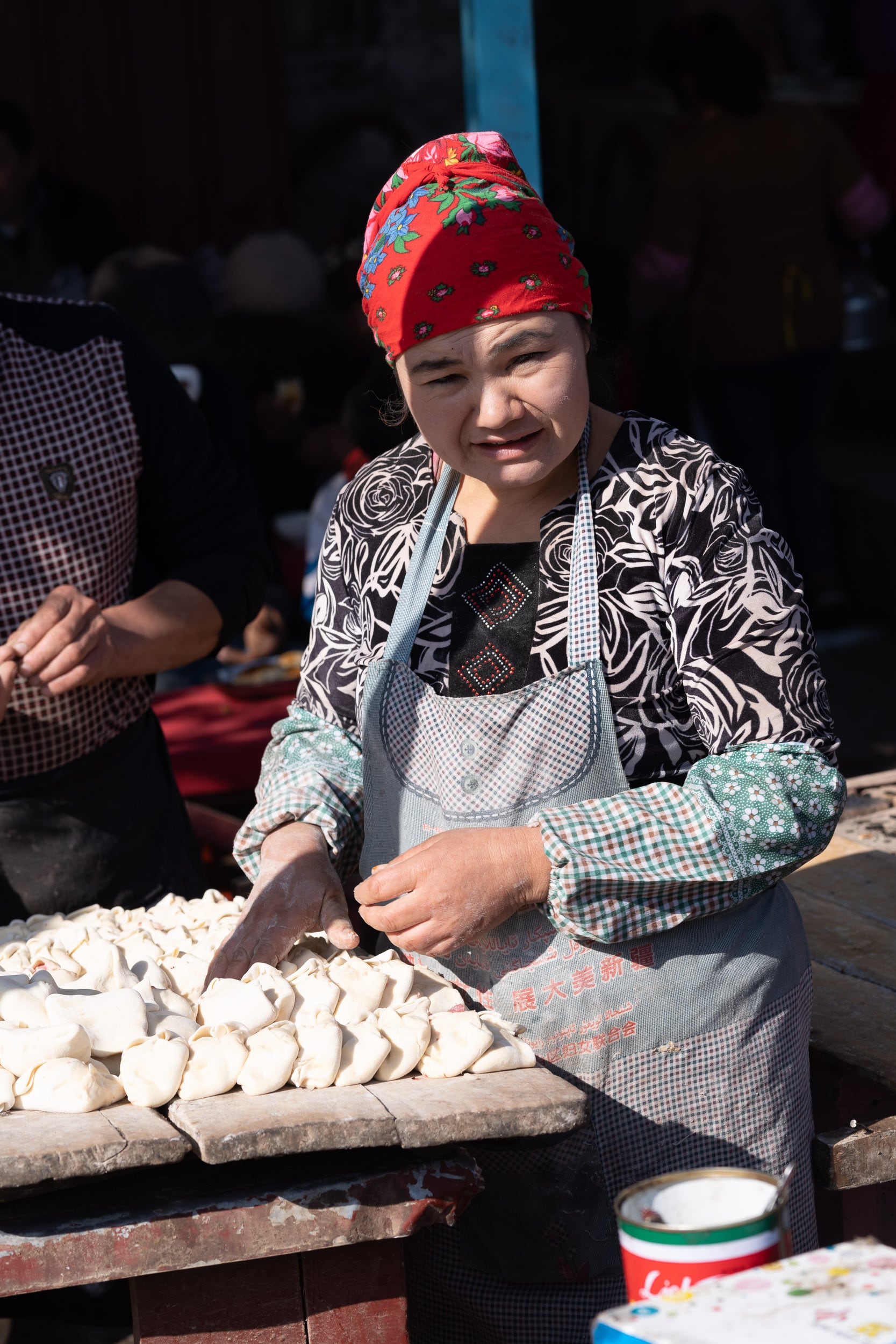 woman preparing somsa Kashgar