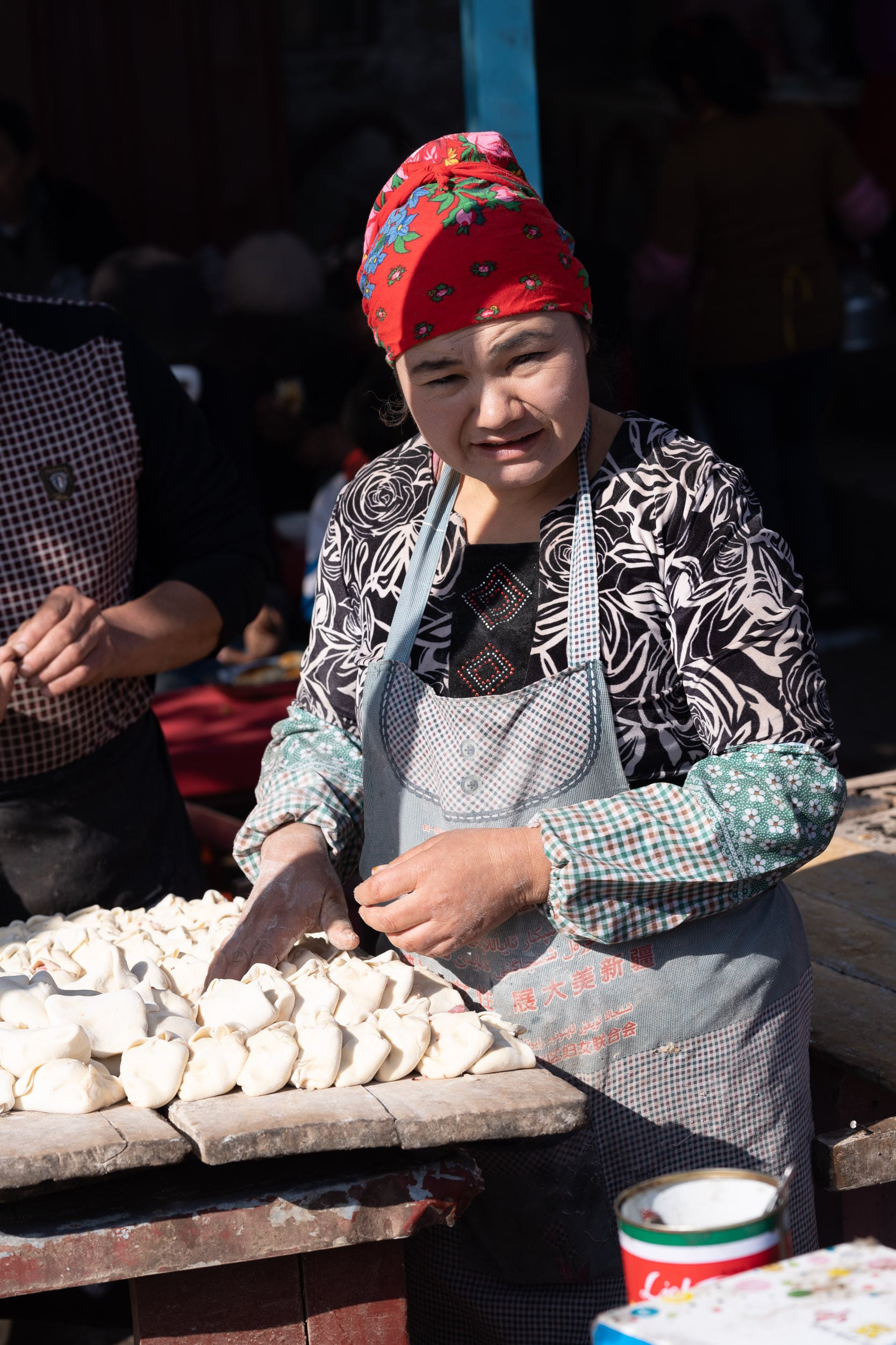 woman preparing somsa Kashgar woman preparing somsa Kashgar